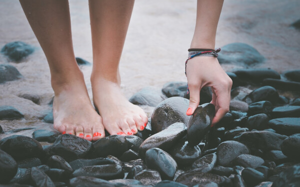 Feet on Pebbles